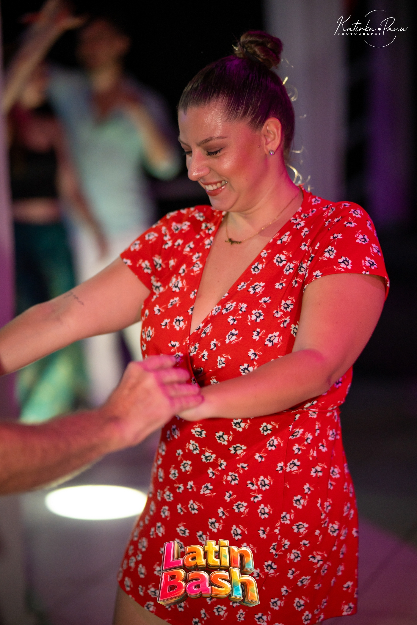 Smiling while dancing with a partner