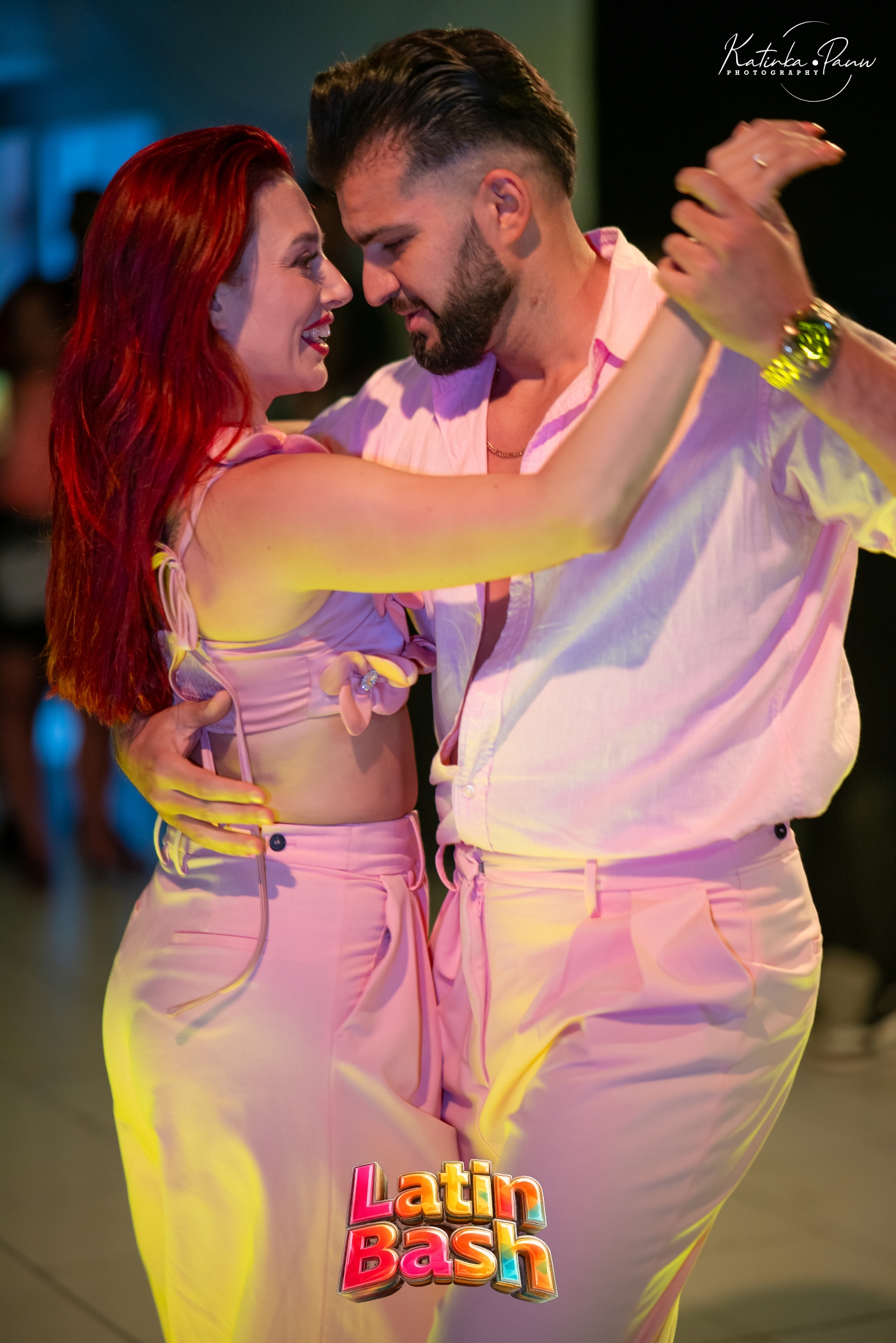 Dance couple smiling at each other